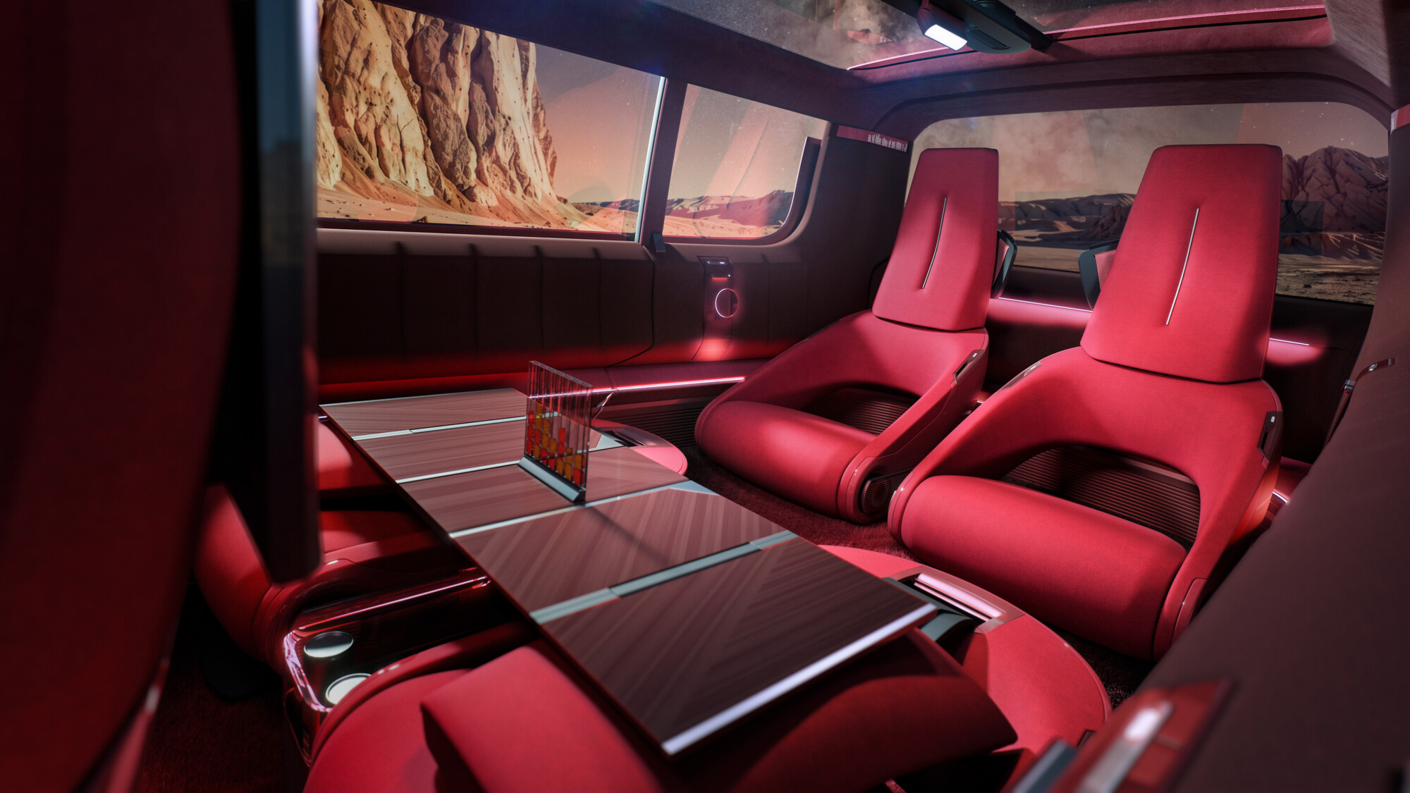 Renault E-Space Concept kabininde masa etrafında dizilmiş kırmızı bireysel koltuklar